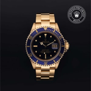 Rolex Submariner Date in Yellow gold, 16808 - Bucherer