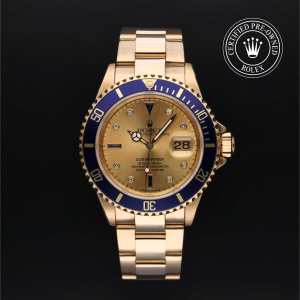Rolex Submariner Date in Yellow gold, 16618 - Bucherer