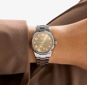 NOMOS Glashütte Club in Steel, 755 Club Sport neomatik 34gold - Bucherer