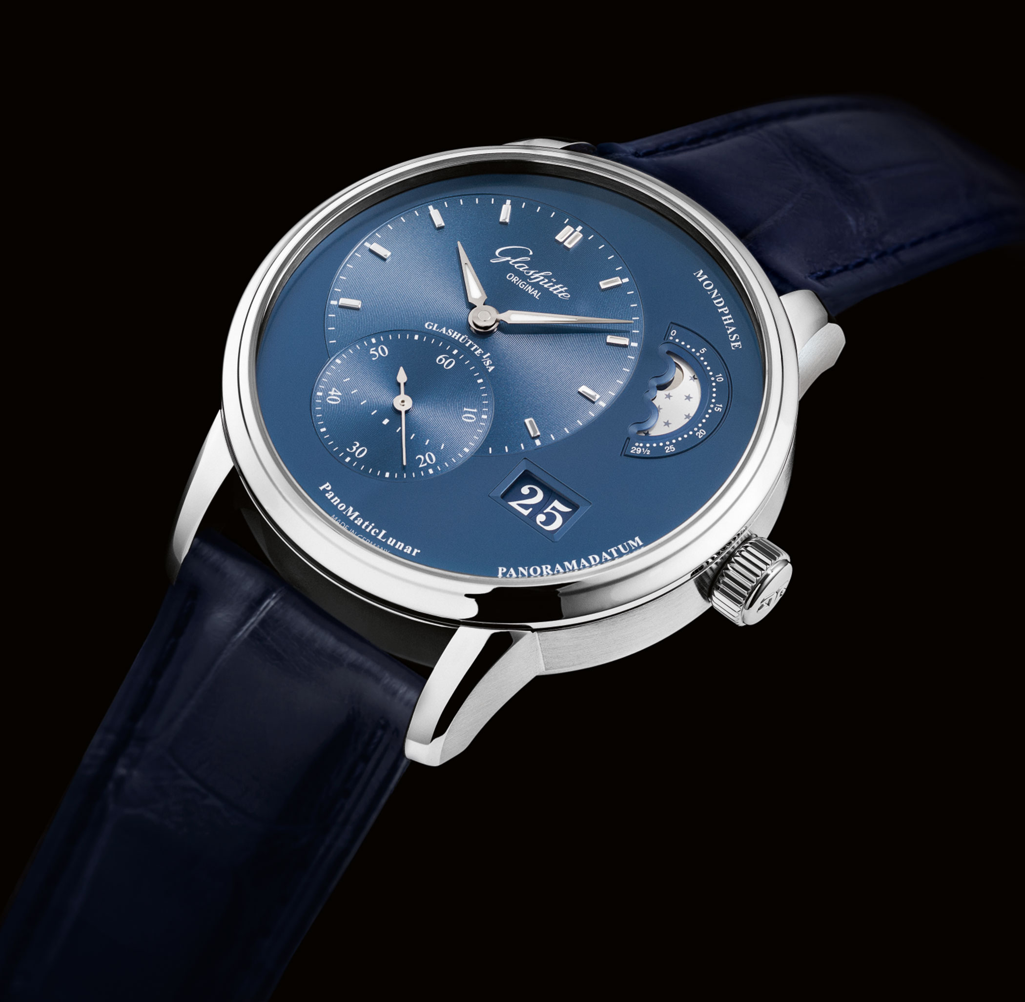 A Glashütte PanoMaticLunar wristwatch with blue dial, asymmetrical layout, moon phase display and panorama date, shown with leather strap.