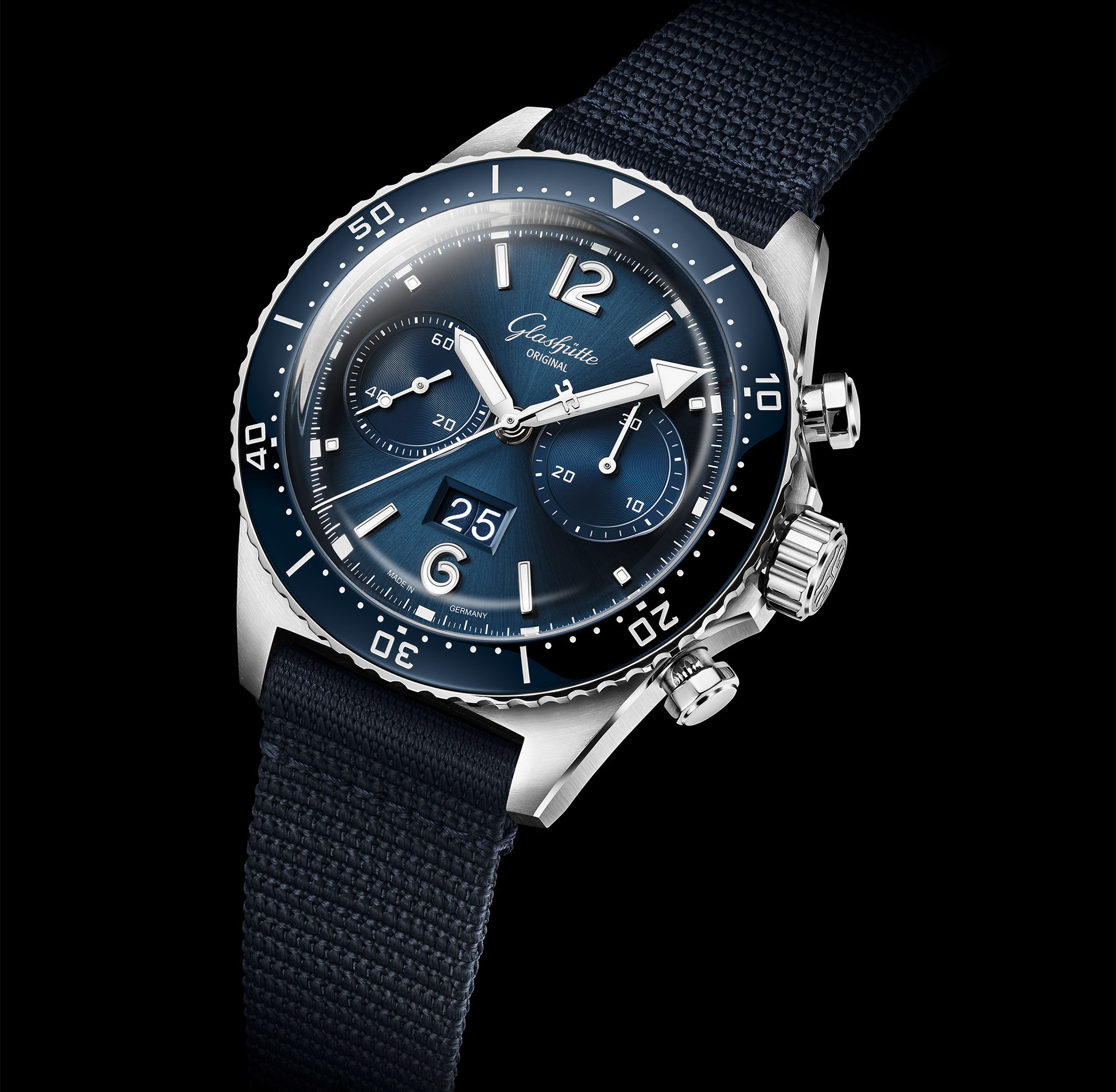 A Glashütte Original SeaQ chronograph with blue dial, large date display, dive bezel and sporty navy blue fabric strap.