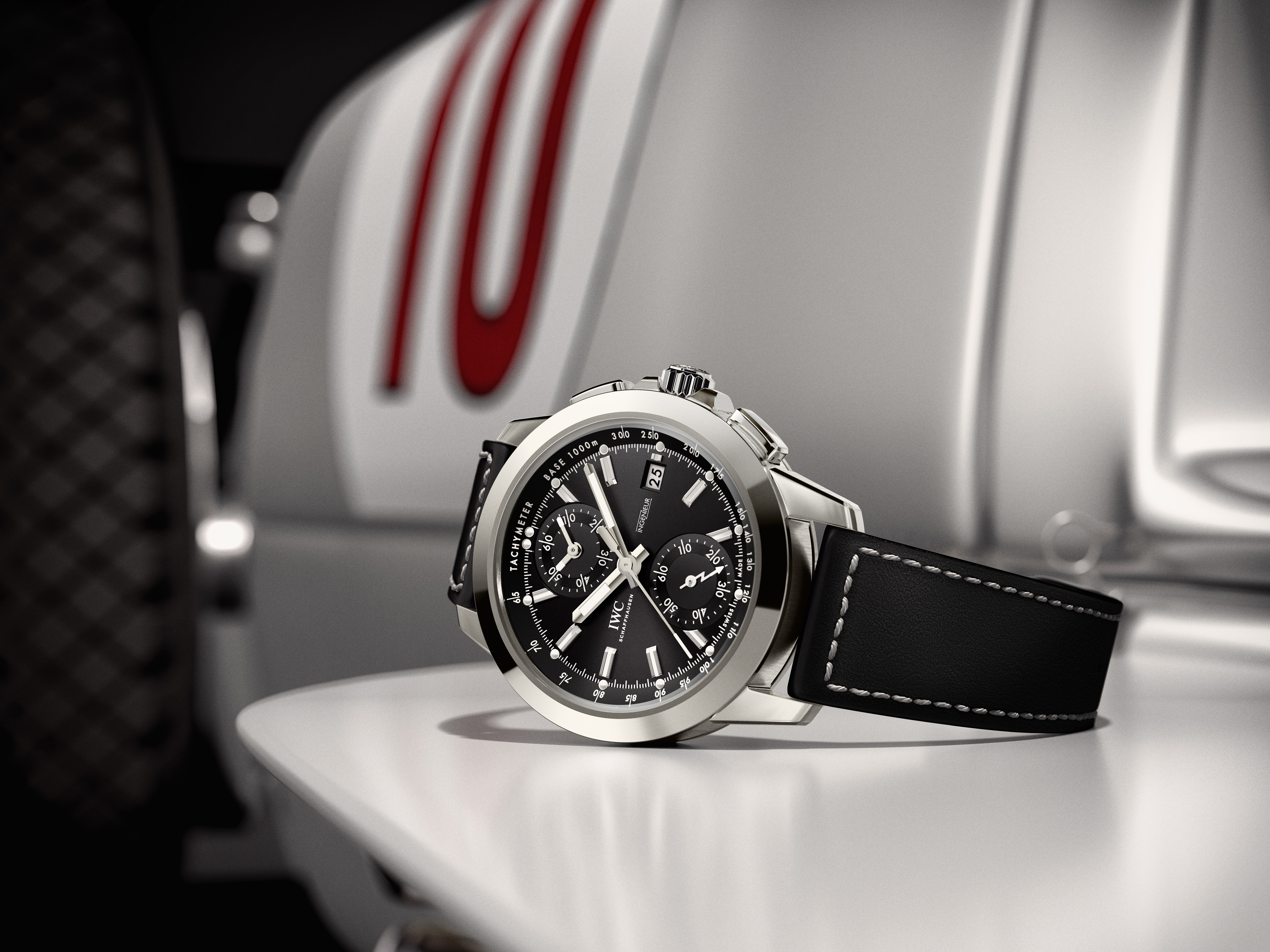 A IWC Schaffhausen Ingenieur Chronograph with black dial, tachymeter scale and black leather strap with contrast stitching