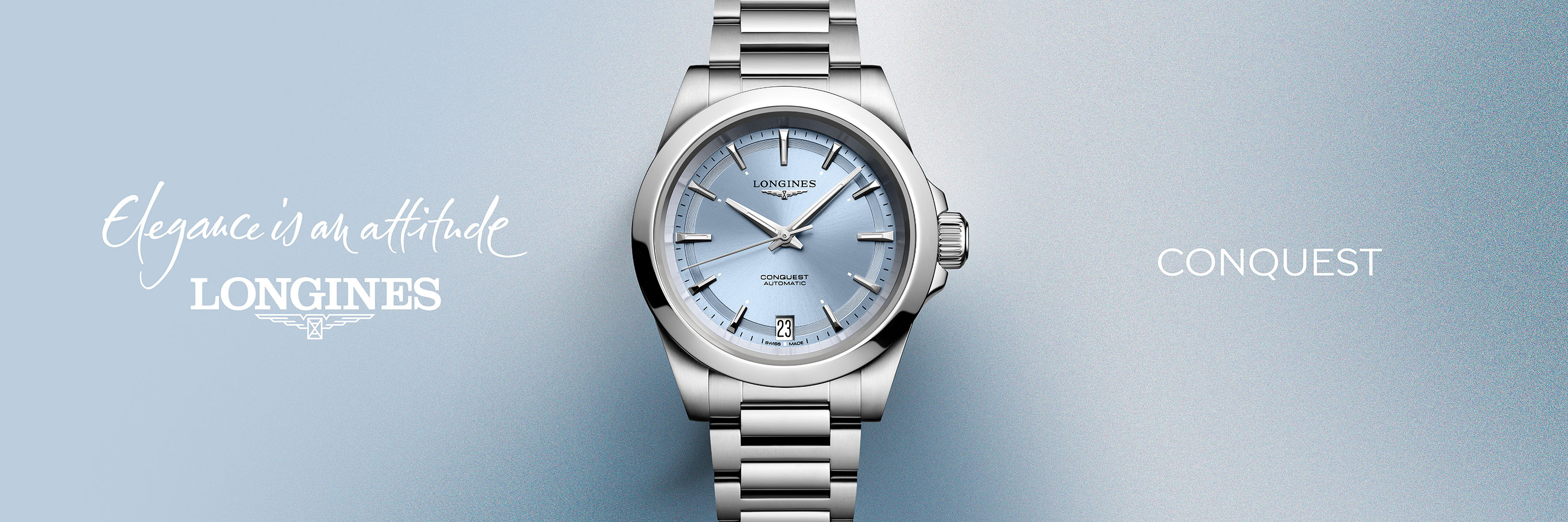 A Longines Conquest with a silver and blue dial and stainless steel bracelet.