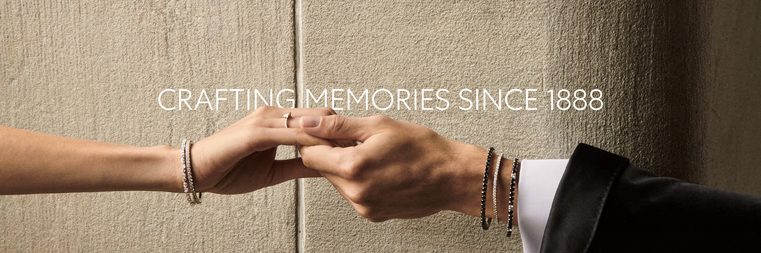 Modern and elegant interior design featuring a marble dining table surrounded by stylish chairs, accented with large floral arrangements. The room includes minimalist shelving, soft lighting, and a sleek contemporary decor with a statement light fixture hanging above.