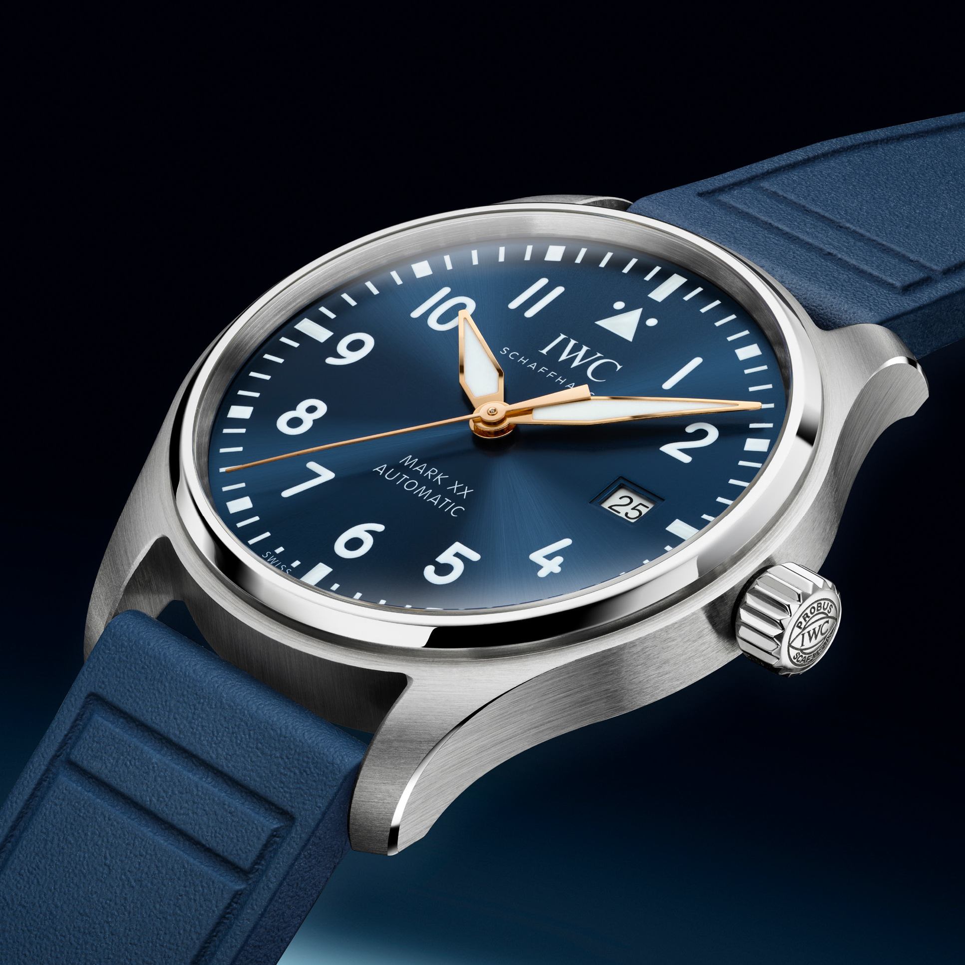 A silver IWC Schaffhausen Mark XX Automatic watch with a blue face, gold hands, and a blue rubber strap.