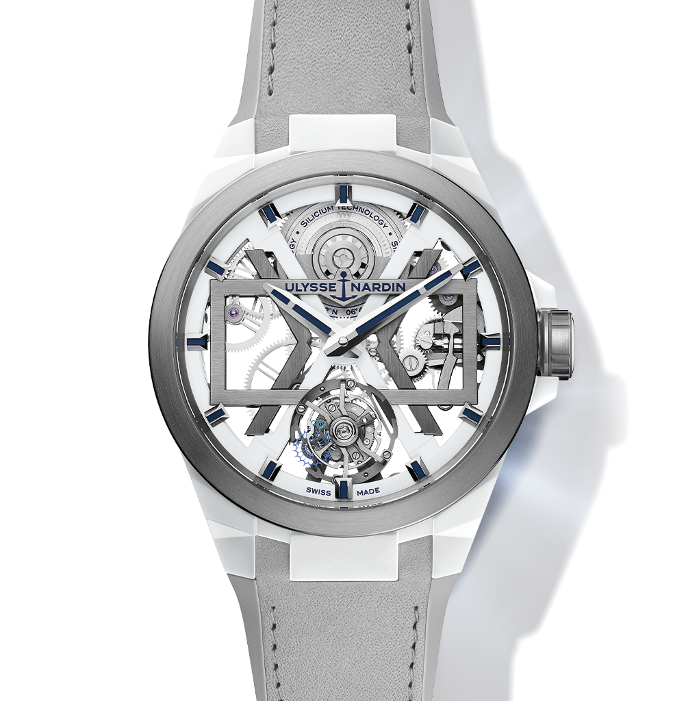 A white and gray Ulysse Nardin Blast Free Wheel watch with a visible tourbillon and movement.