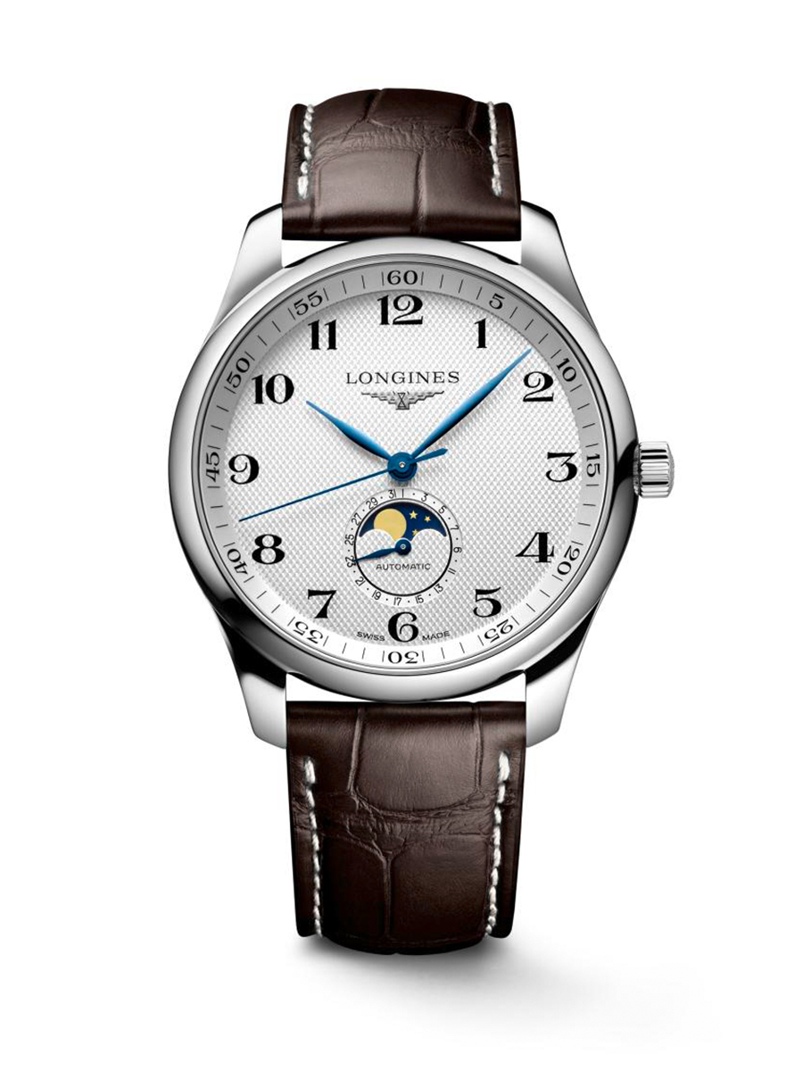 A silver Longines watch with a white textured face, blue hands, and a brown leather strap.
