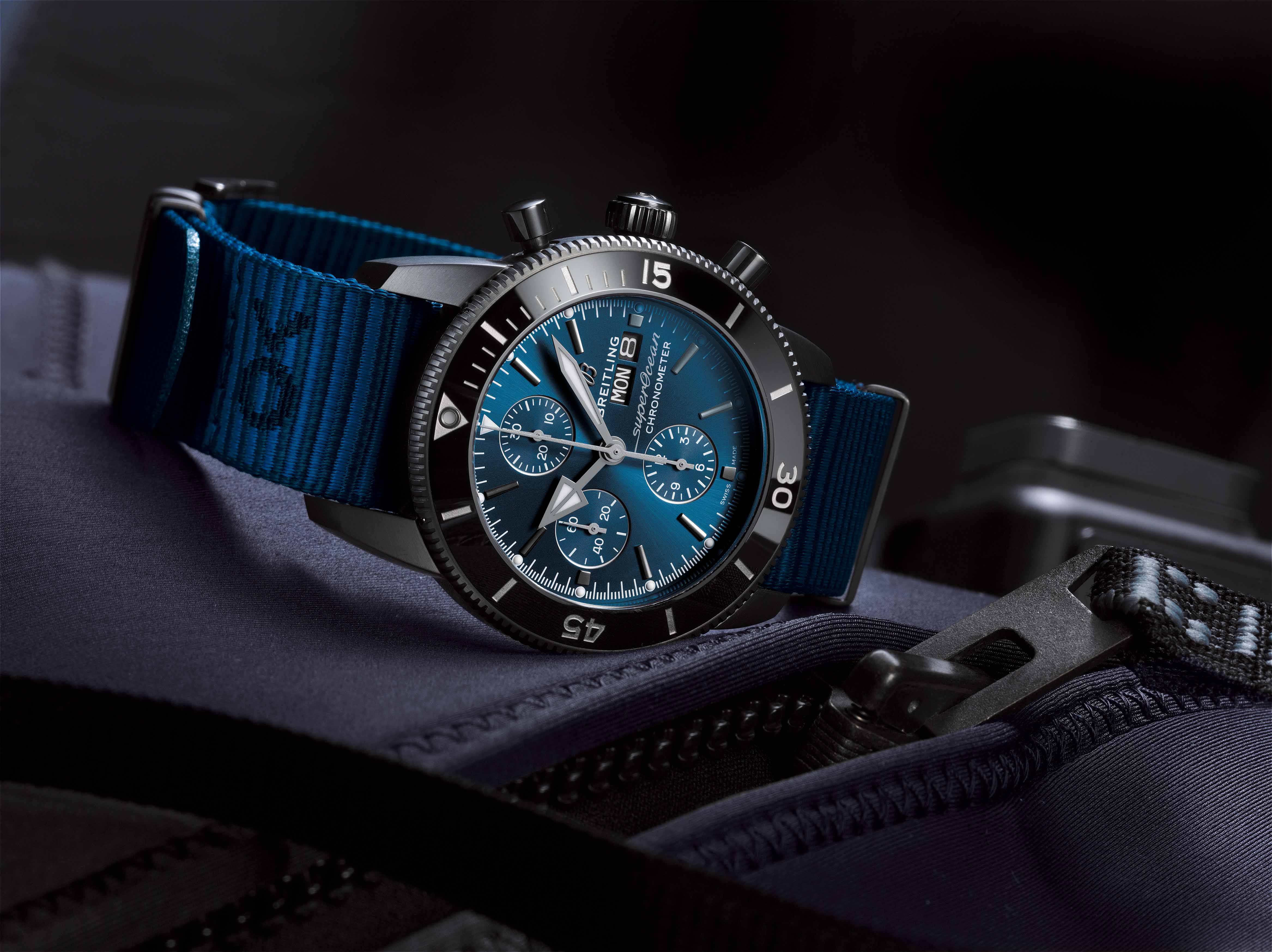 A Breitling “Superocean Heritage II Chronograph 44 Outerknown” with a blue fabric strap and blue dial and seconds display.