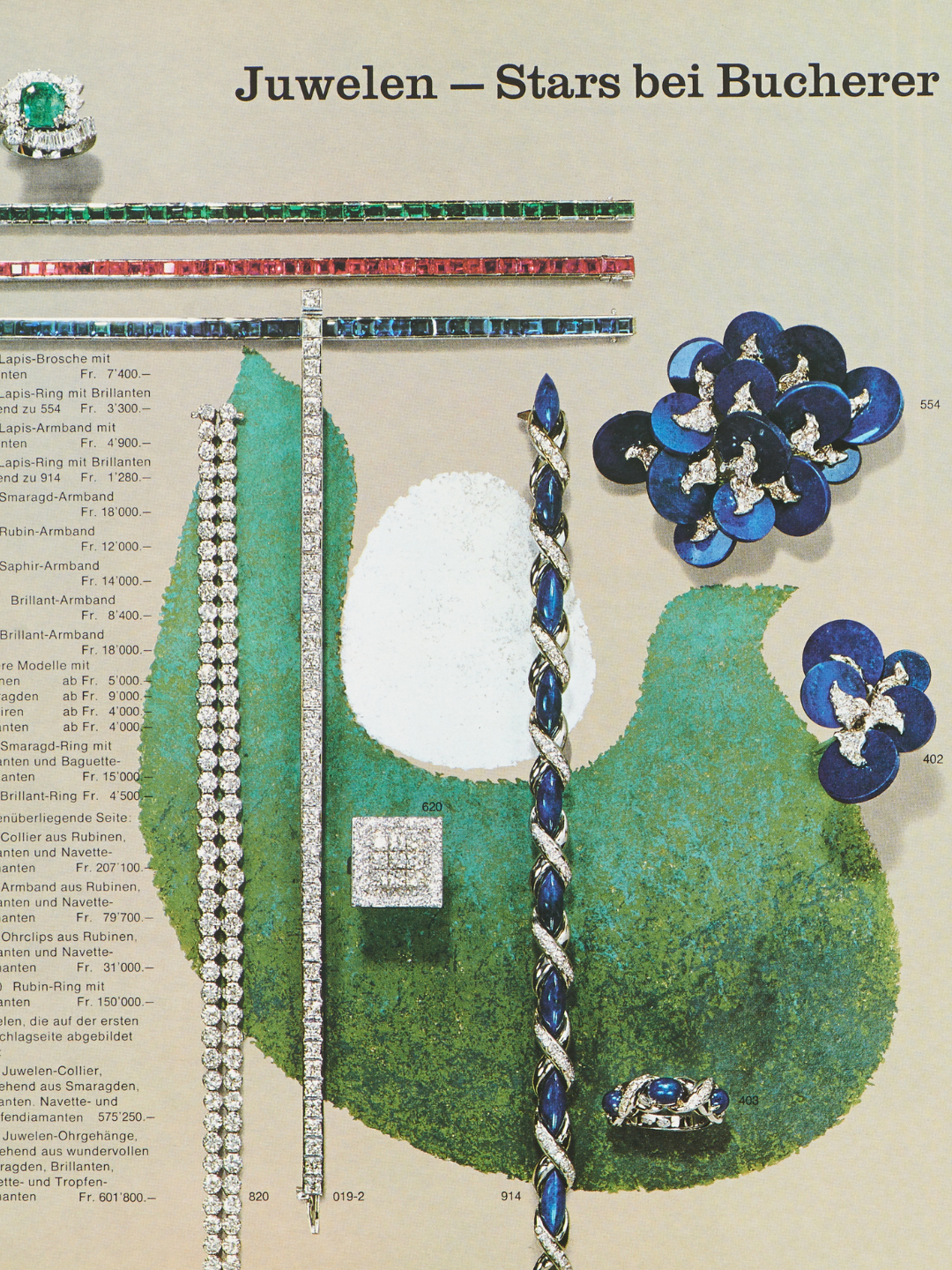 A collection of luxury jewelry, including necklaces, bracelets, rings, and brooches, featuring various gemstones.
