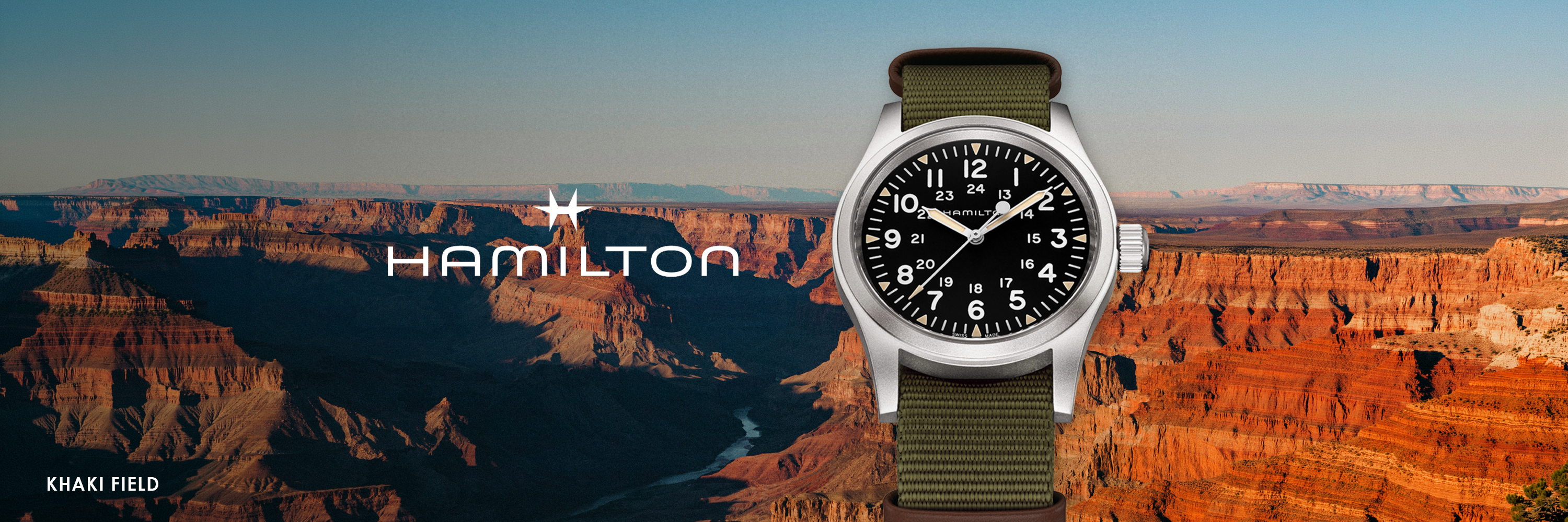 Hamilton watch, green leather strap and black dial.
