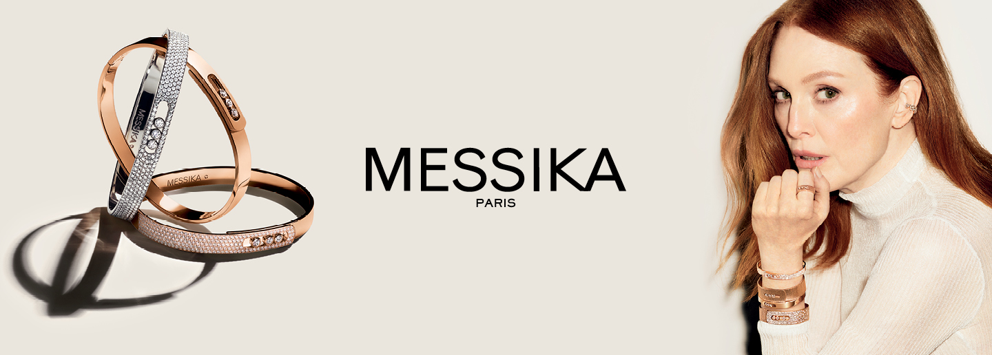 Yellow gold Messika Move bracelets with diamonds on beige background.